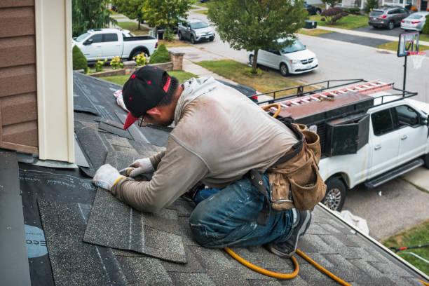 Professional Flat Roof Repair technician working in Rossburg, OH